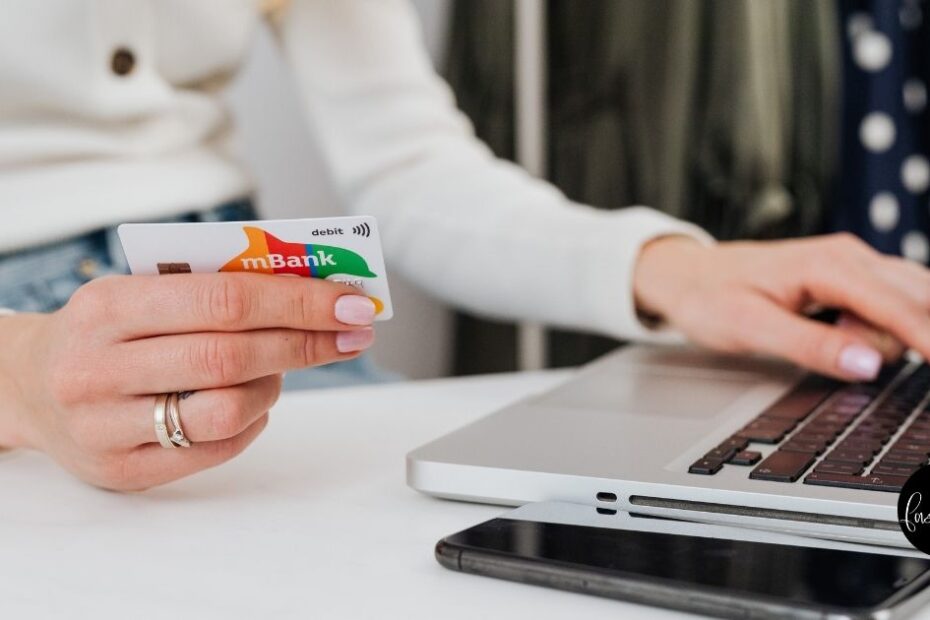 Close up of woman shopping on computer
