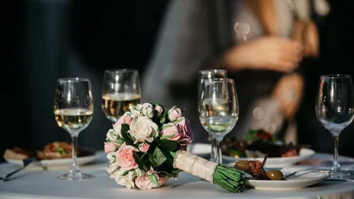 View of table decorated for a wedding reception.