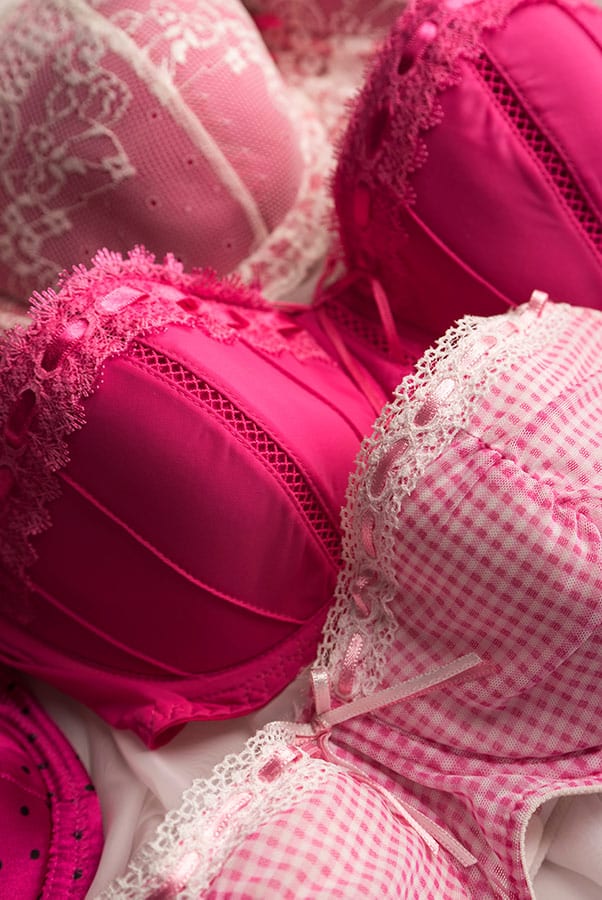 Bra Fitters: How to Find One Near You (Guaranteed) 2 A colorful selection of bras to represent professional bra fitters.