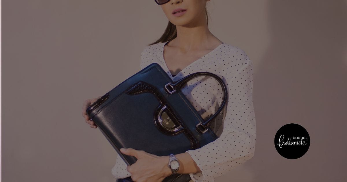 Younger women holding large designer tote bag.