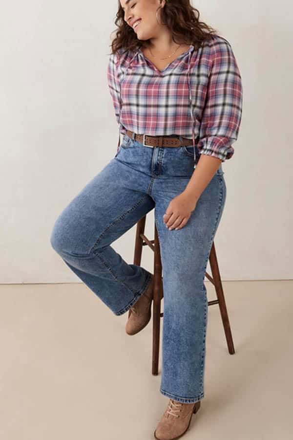 Fall Fashion for Plus Size Fashionistas: 9 Essential Garments to Shop Now 3 Plus-size model wears straight-leg jeans, a fall fashion essential.