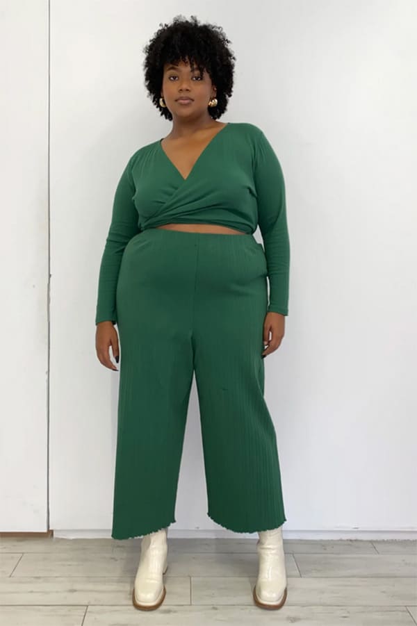 Fall Fashion for Plus Size Fashionistas: 9 Essential Garments to Shop Now 7 Model wears knit pants in plus-size.