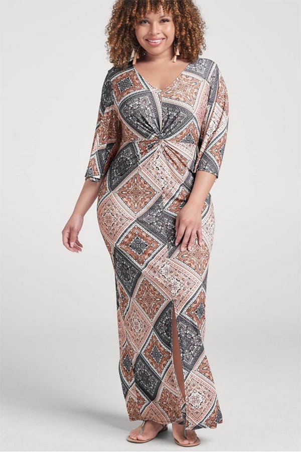 Fall Fashion for Plus Size Fashionistas: 9 Essential Garments to Shop Now 8 Model wears patterned maxi dress in plus size.