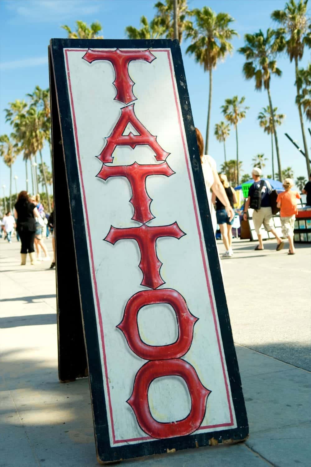 11 Brilliant Budget Halloween Costume Ideas 5 Sandwich board sign for a tattoo shop.