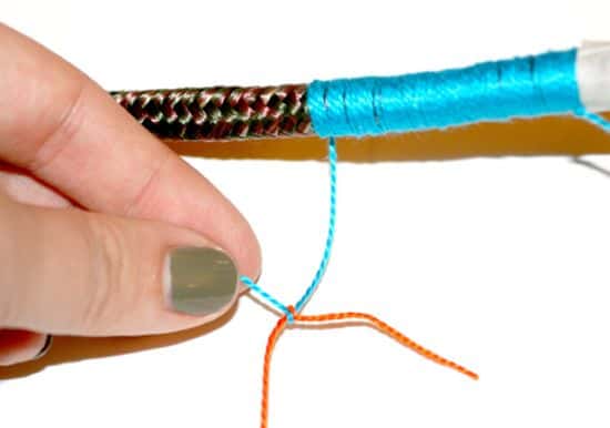 Tying two colors of thread together