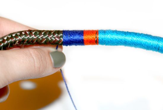 Alternating colors of thread wrapped around rope