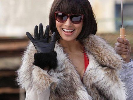 Woman wearing gloves and fur coat