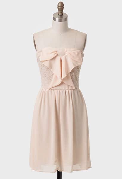 Light pink dress with bow detail on the front