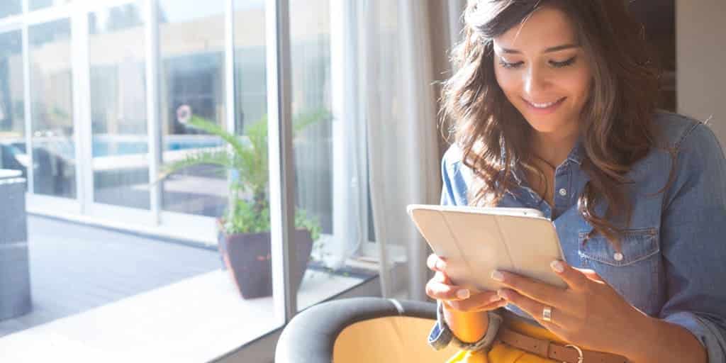 Girl looking at Instagram feed for outfit inspiration