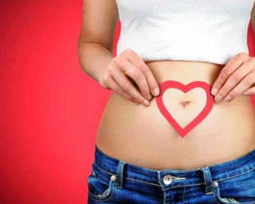Woman showing bare midriff
