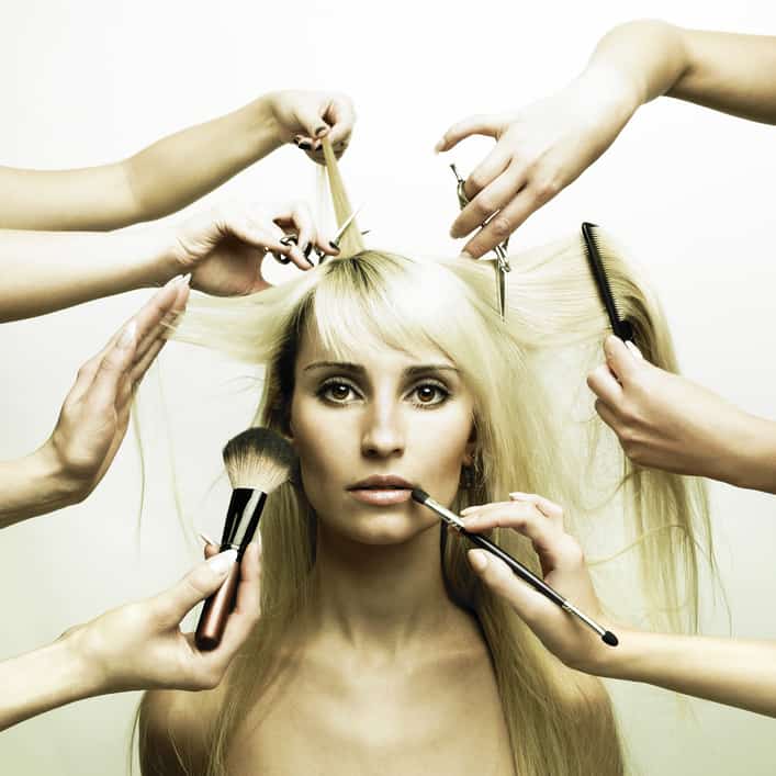 Model and hands of stylists