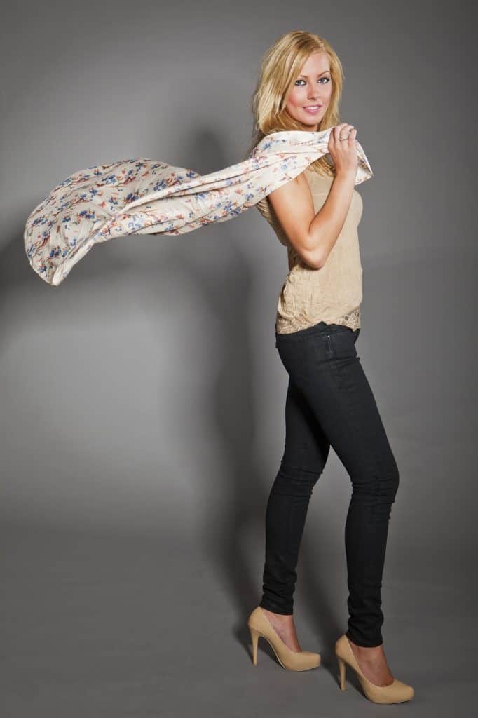 woman in jeans and a scarf