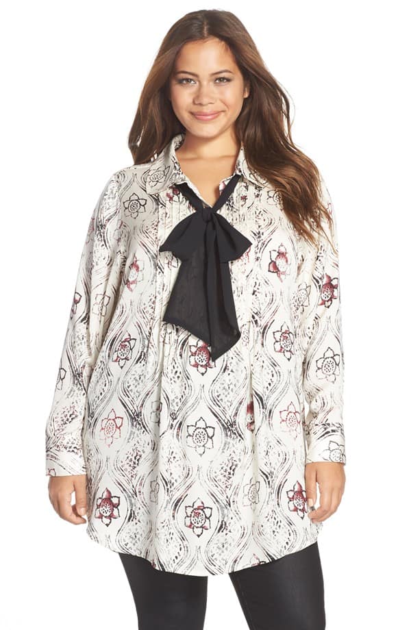 Woman wearing tie neck blouse