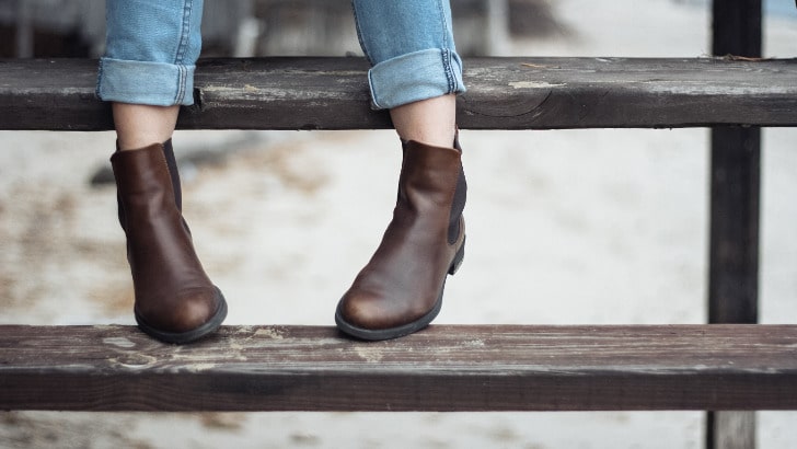 Close up of legs wearing women's Chelsea boots.