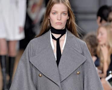 Runway model wearing skinny scarf