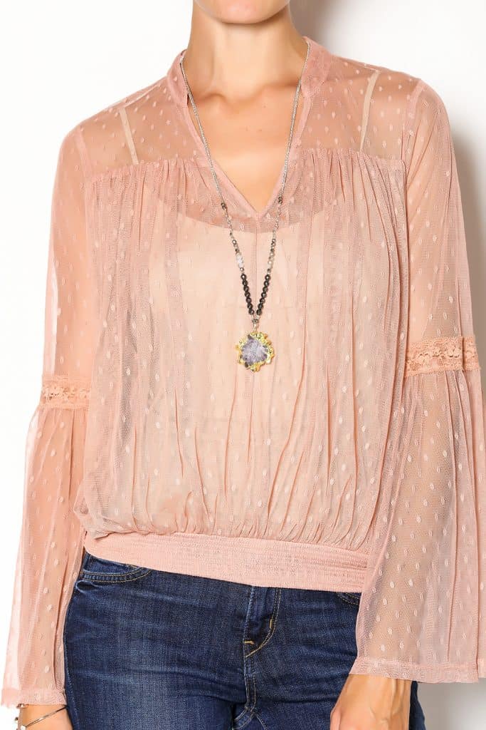 model wearing rose quartz blouse