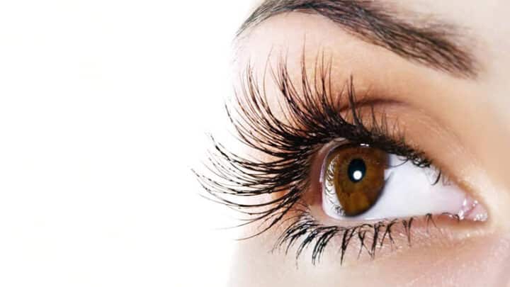 Close-up of eye with long eyelashes.