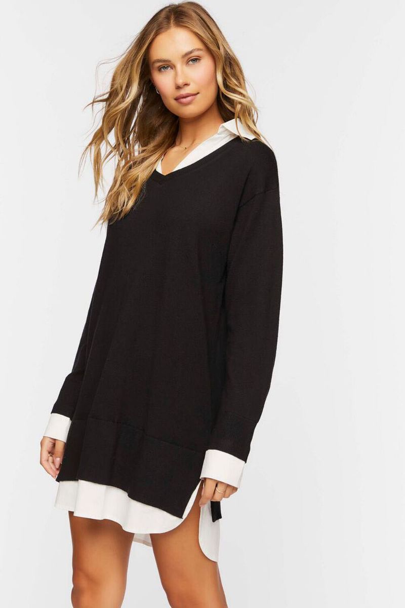Model wears black sweater dress with white collar and cuffs.