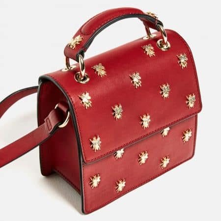 Red box bag with metal embellishments