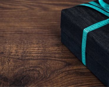 Wrapped generic gift on table.