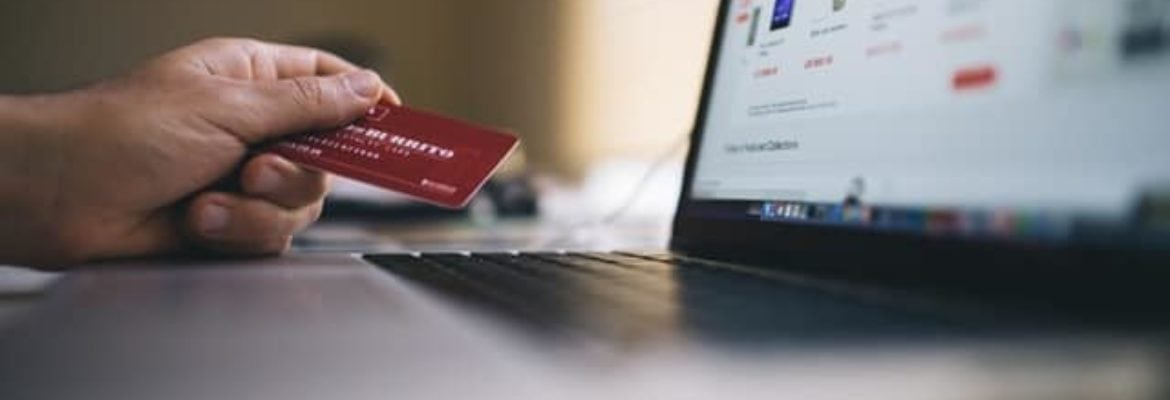 someone shopping online with credit card