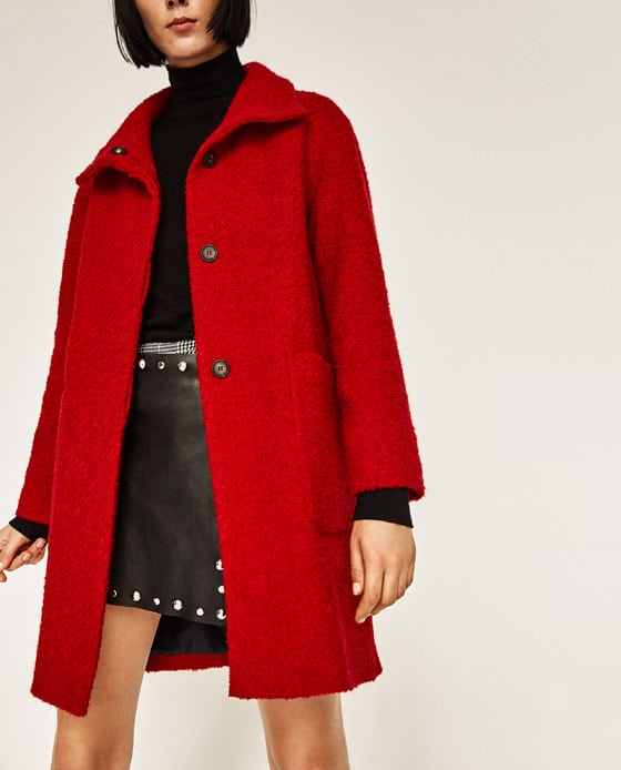 woman wearing red a line coat