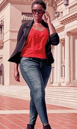 Woman wearing skinny jeans and red sweater