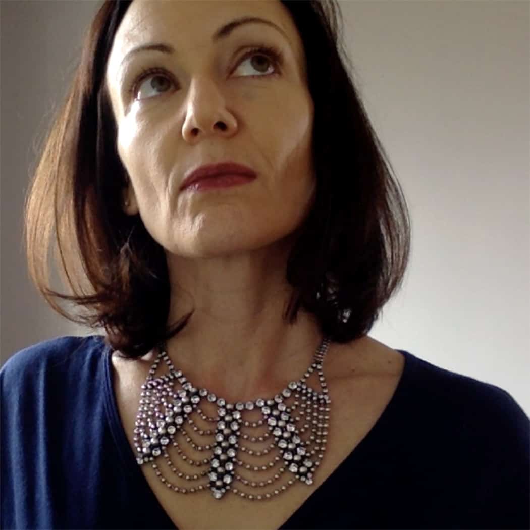 Catherine Brock of Budget Fashionista wearing Dannijo Marina Bib necklace