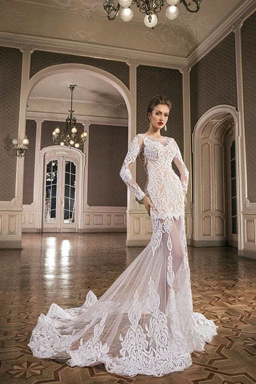 Woman wearing floor-length bridal gown with train 