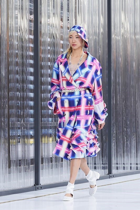 Hot summer fabrics - model wearing bright pink and blue dress