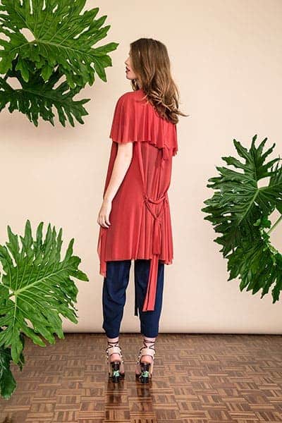 Summer fabrics trends - coral colored cardigan in a mesh fabric