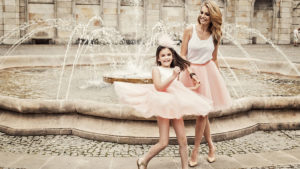 Mom and daughter wearing matching outfits