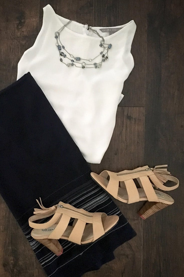 SSh-oes: The Simple Solution to Loud Heels 2 Sshoes are the solution to loud heels. Here, they're styled with a midi skirt, white blouse and statement necklace.