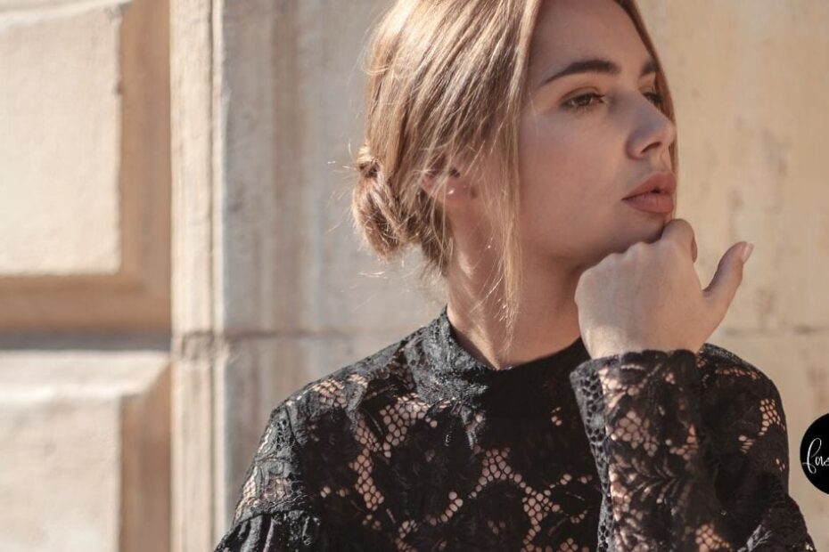 Model wears lace dress