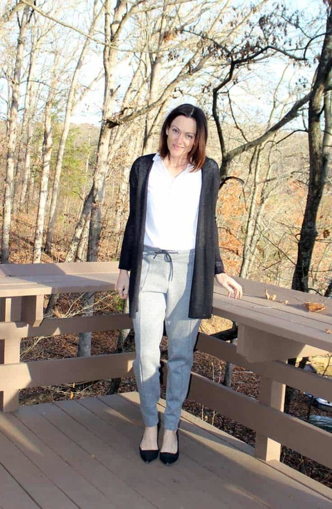 Nike joggers with a knit cardigan and pumps