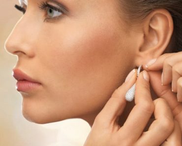Woman wearing expensive earrings