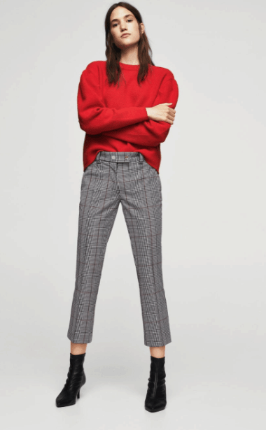 Checked crop pants with red sweater and black boots