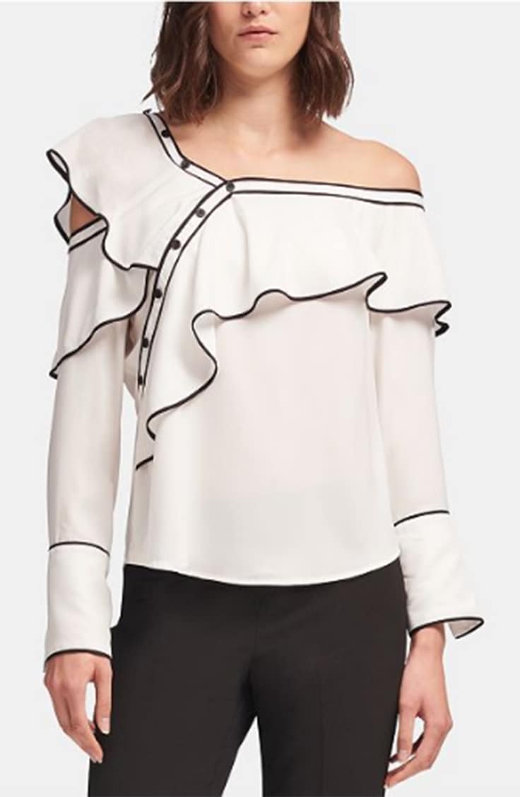 White ruffle blouse with black trim