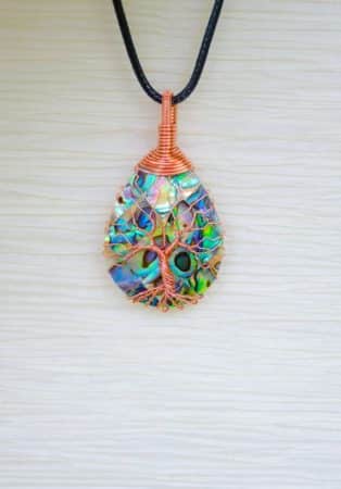 Colorful pendant necklace on black chord
