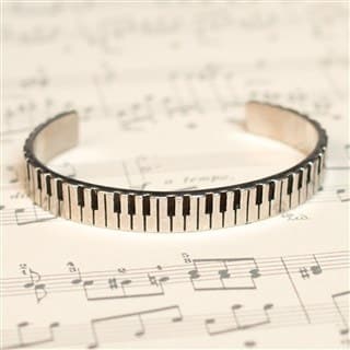 Cuff bracelet with piano keys design
