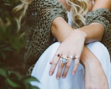 Woman wearing multiple rings