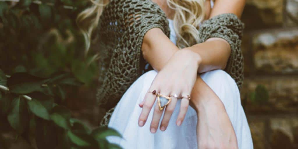 Woman wearing multiple rings