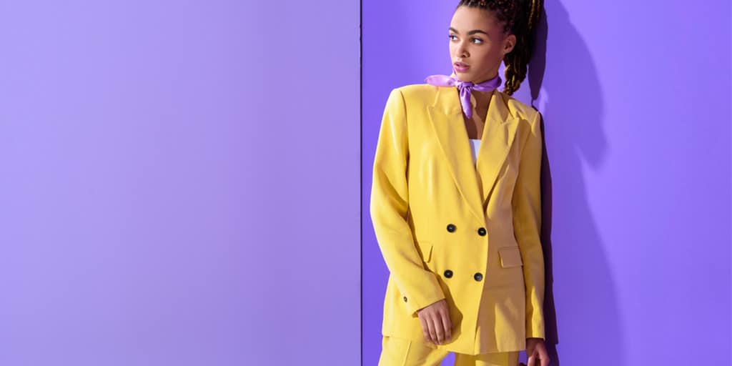 Woman in bright yellow suit