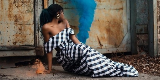 Woman wearing plaid patterned dress