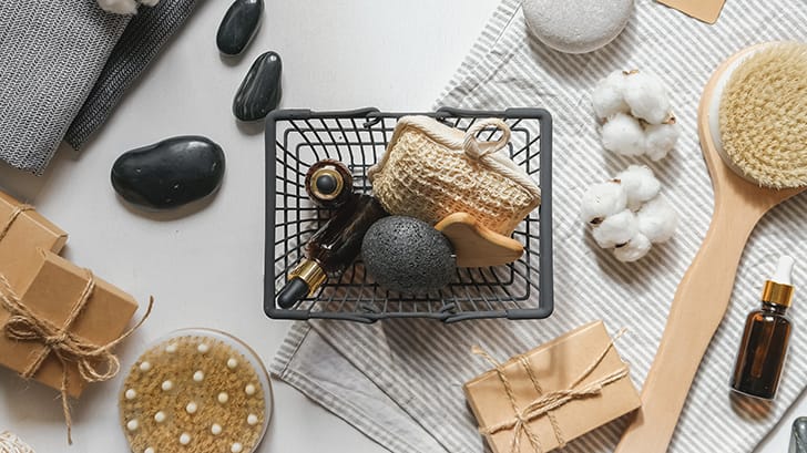 Beauty products laid out on table.