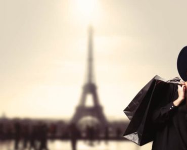 Stylish woman shopping in Paris