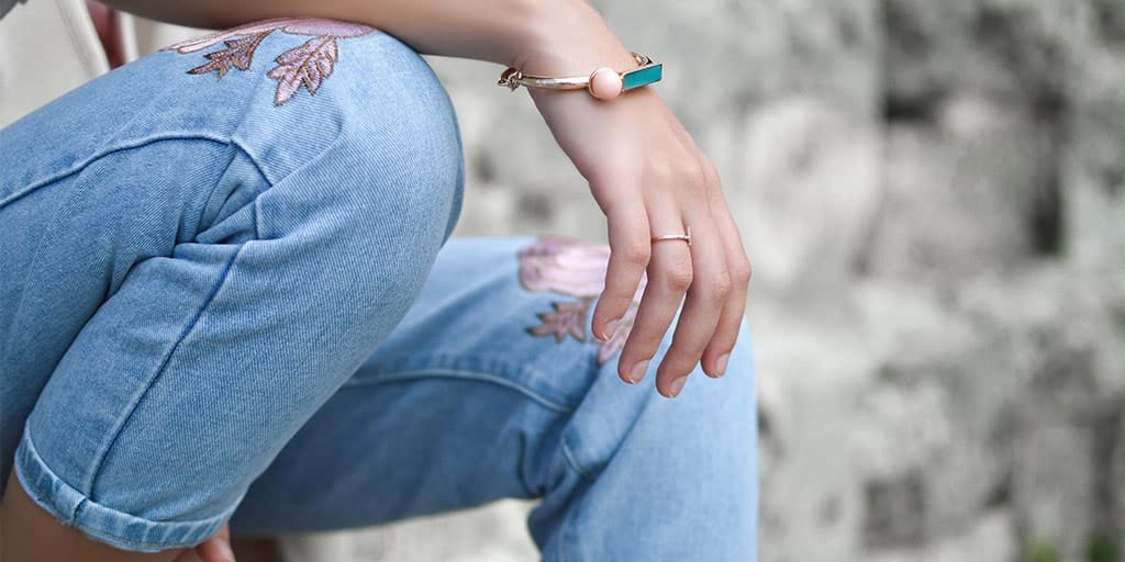 close up of embroidered jeans