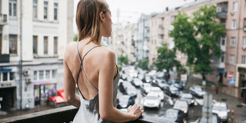 Woman wearing backless slip dress