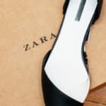 Pointed toe shoe sitting atop a Zara box.