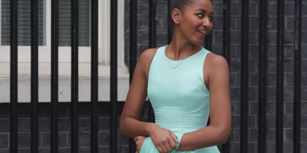 Malia Obama wearing a mint green dress